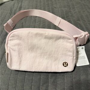 lulu belt bag baby pink with gold